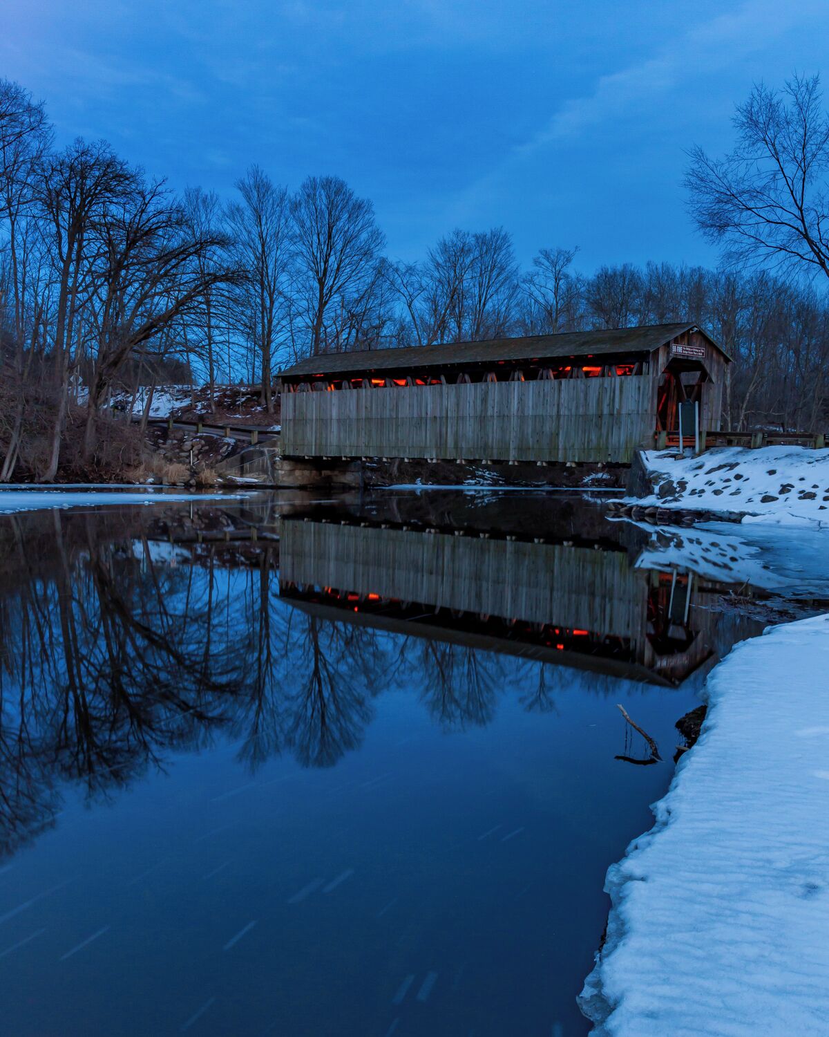 The Fallasburg bridge is part of Fallasburg park and historical villages. There is a little roadside park with a picnic table and little grill. In the summer people load and unload kayaks/canoes or tubes in the river. 