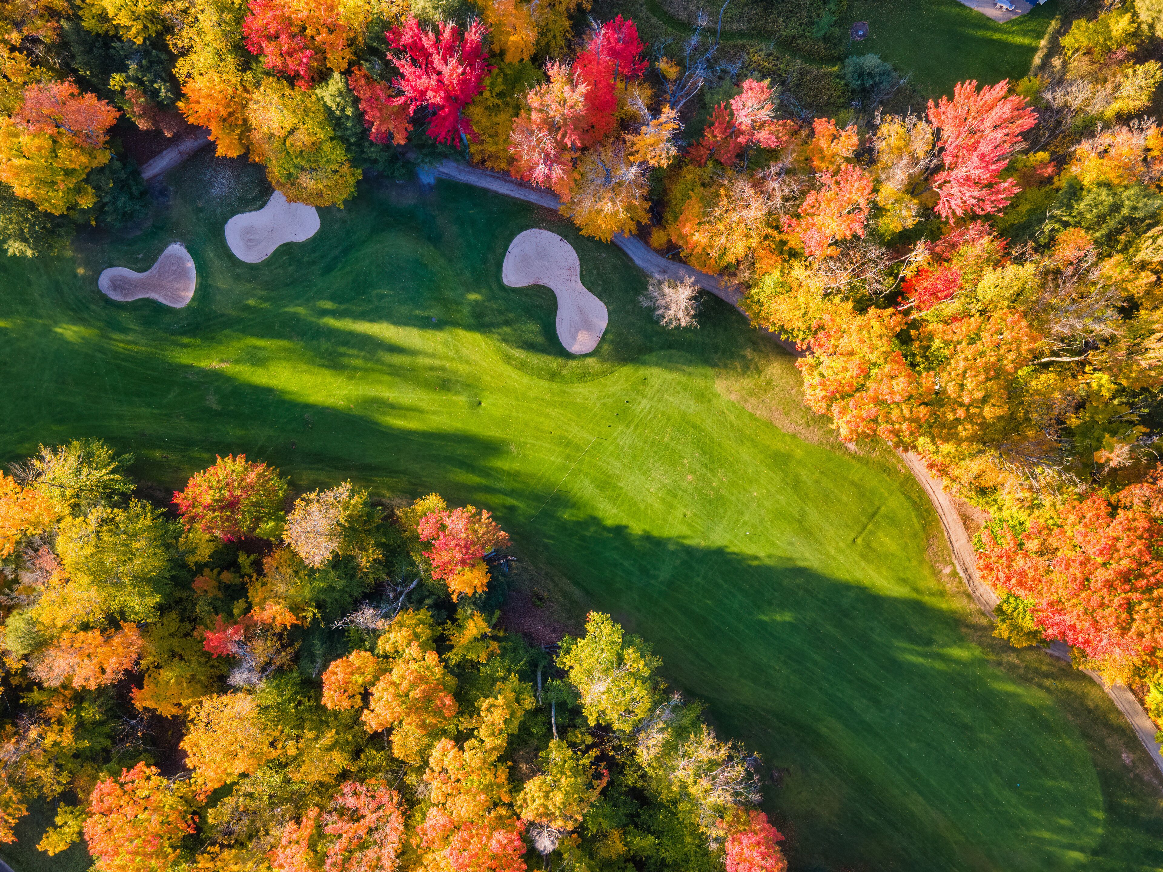 Beautiful late day sun light  on the Caberfae Peaks Golf course in autumn - central Michigan countryside near Cadillac