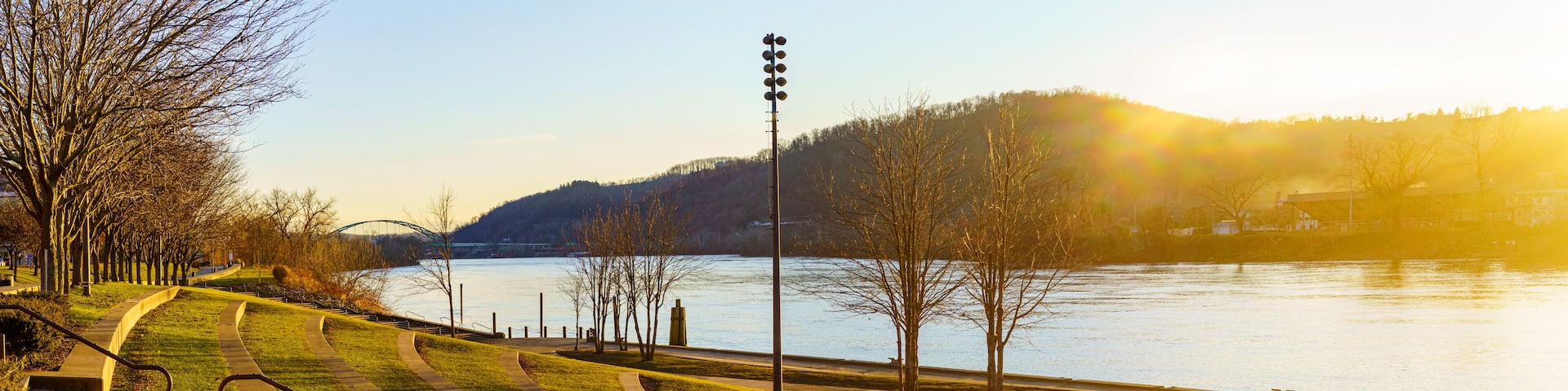 Panoramic view of the Ohio River with Vietnam Veterans Memorial Bridge between Wheeling West Virginia and Ohio, seen from Heritage Port amphitheater. in Wheeling, January 2022.