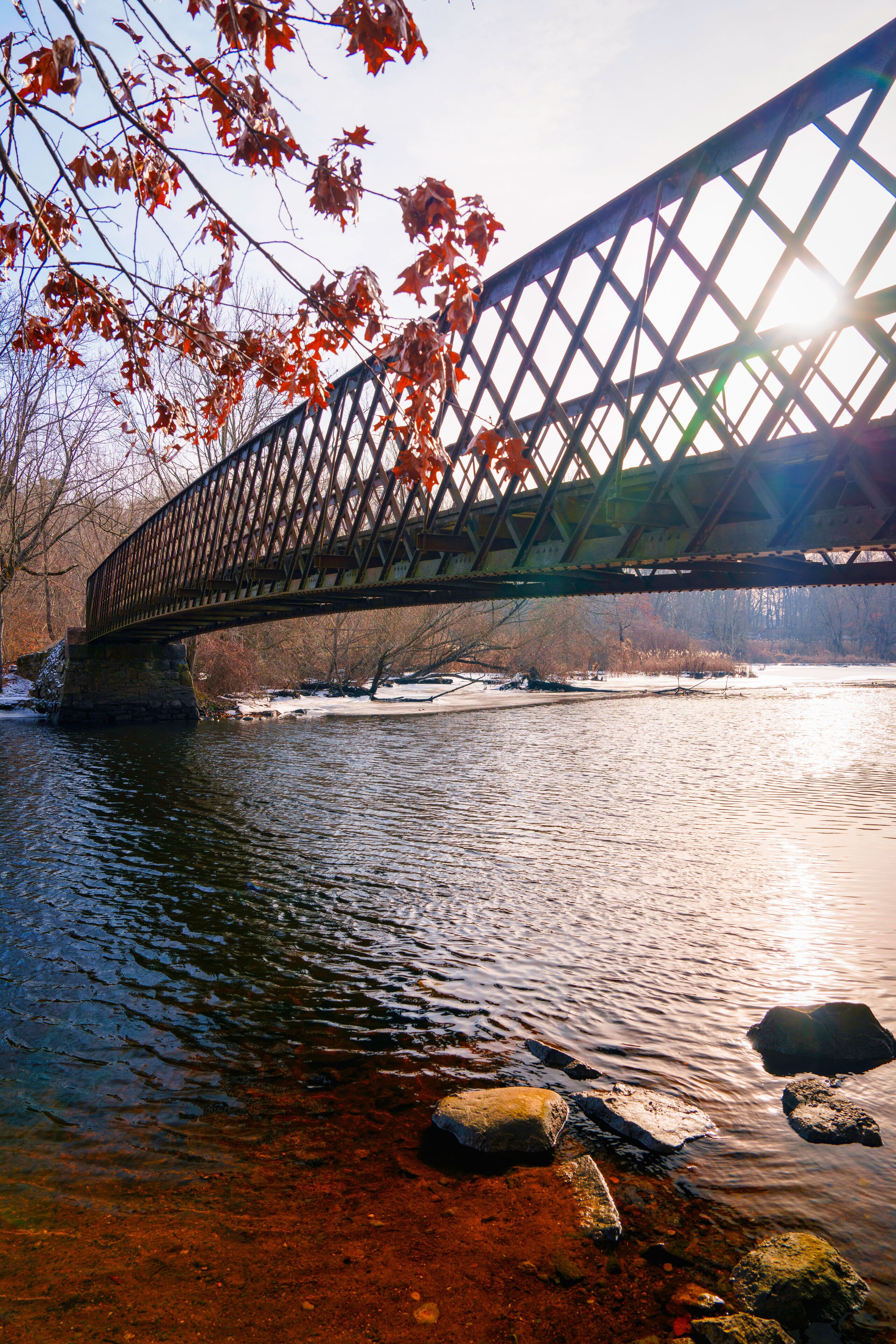 Historic Pedestrian Footbridge over the Mill River in East Rock Park, New Haven, Connecticut: Winter Landscape in New England of America