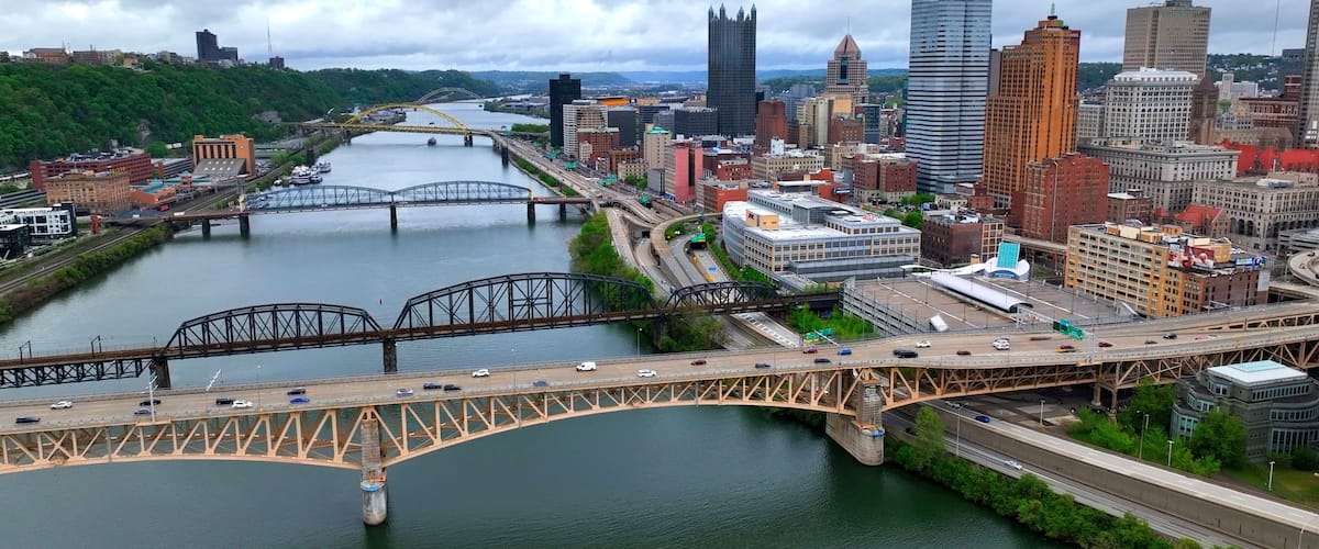 Pittsburg, Pennsylvania city skyline with office towers, streets, highways, bridges urban living in a big city in America that is known as the industrial capital