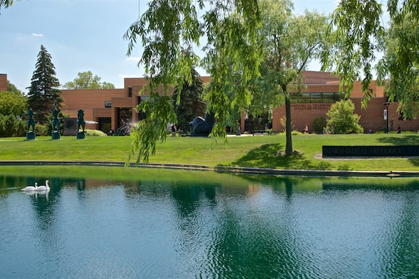A pond with swans, a sculpture garden, and the Marshall M. Fredericks Sculpture Museum.