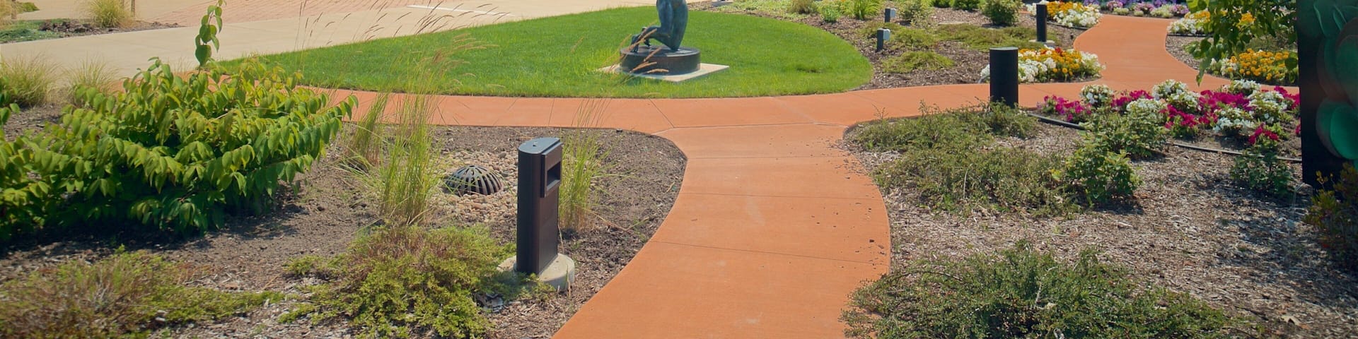 Marshall M. Fredericks Sculpture Museum featuring a garden