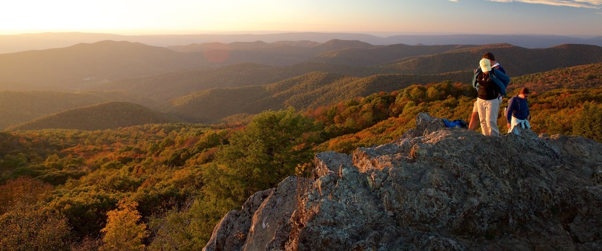 Bearfence Mountain which includes landscape views, a sunset and hiking or walking