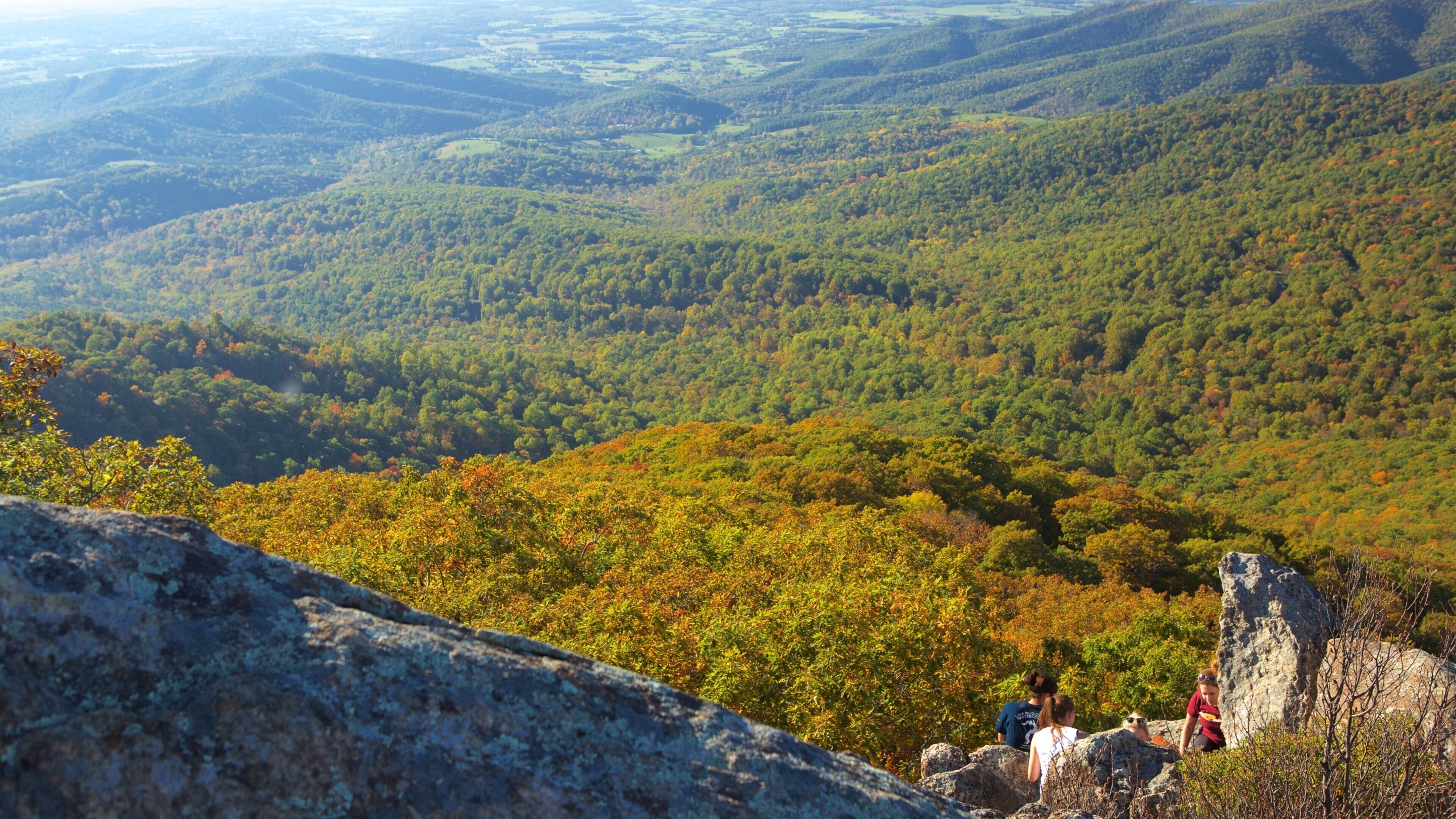 Mary\'s Rock Summit Trail showing landscape views and tranquil scenes as well as a small group of people