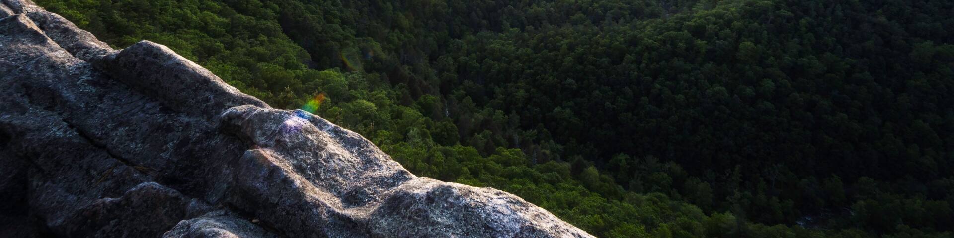 Late afternoon at Buzzard Rock as the sun sets behind the Blue Ridge Mountains.