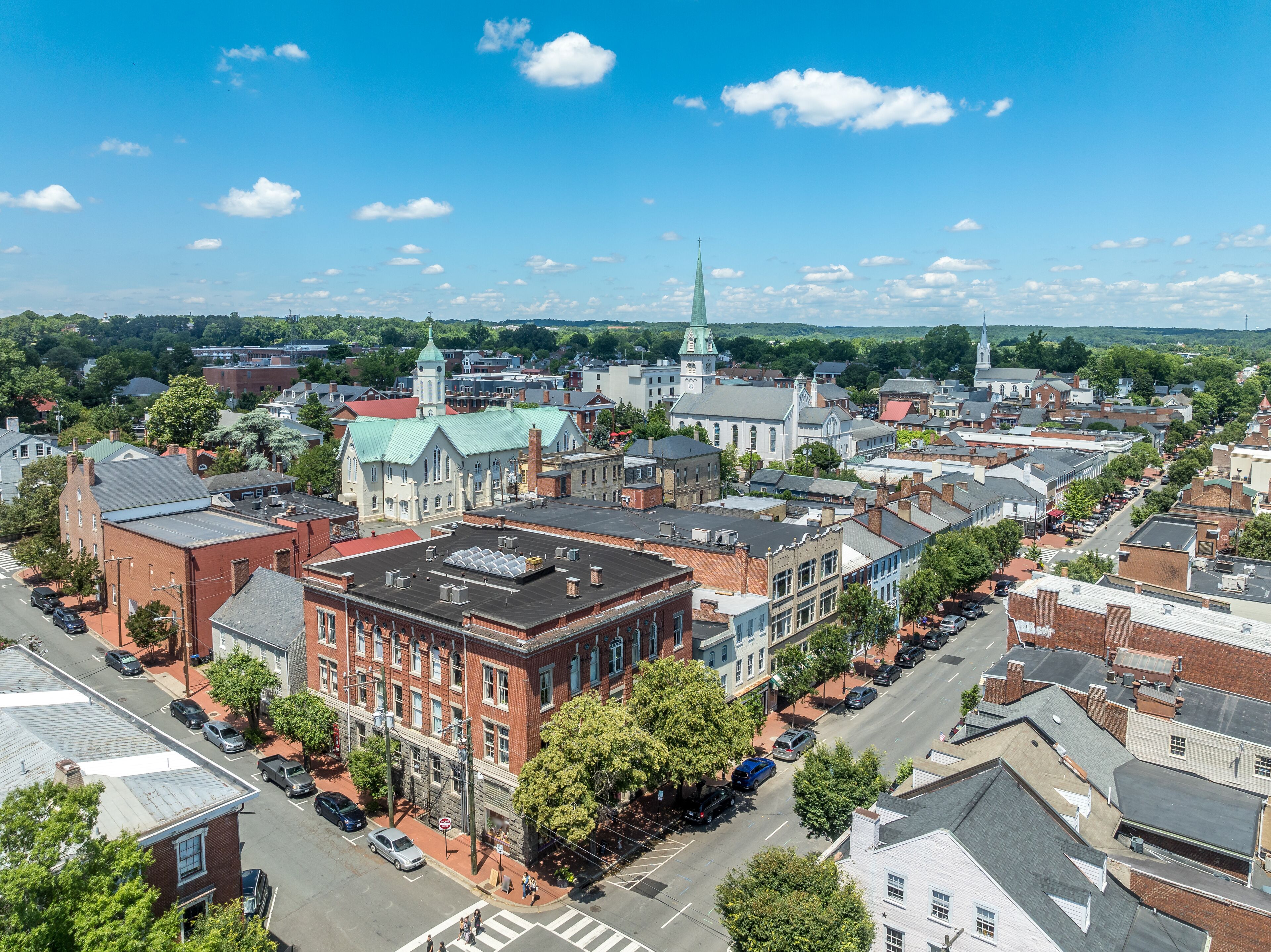 Aerial view Fredericksburg Virginia with Circuit Court building , historic business district, Baptist church, Chatham bridge over Rappahannock River