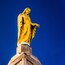 Statue on top of The National Shrine Grotto of Lourdes in Emmits