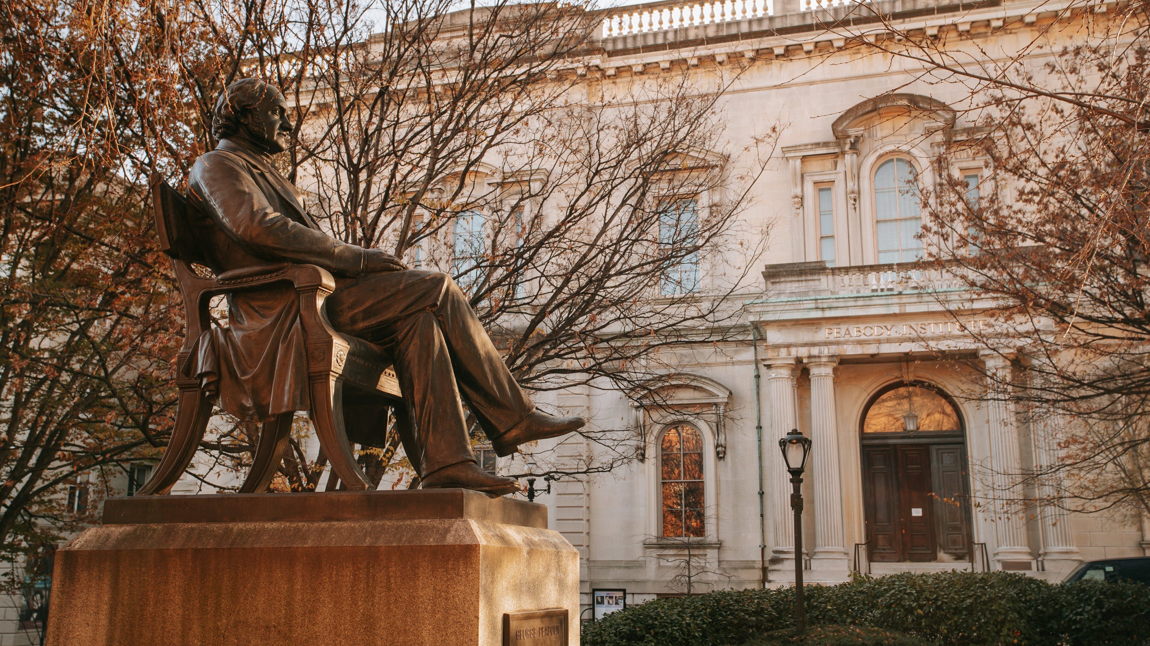 George Peabody Library which includes heritage architecture and a statue or sculpture
