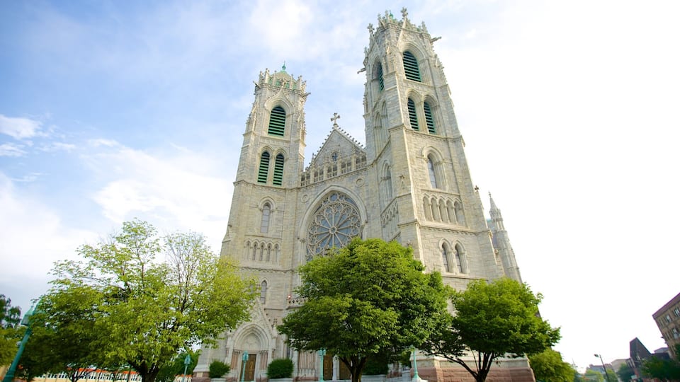 A large Gothic-style cathedral with twin towers and a large rose window.