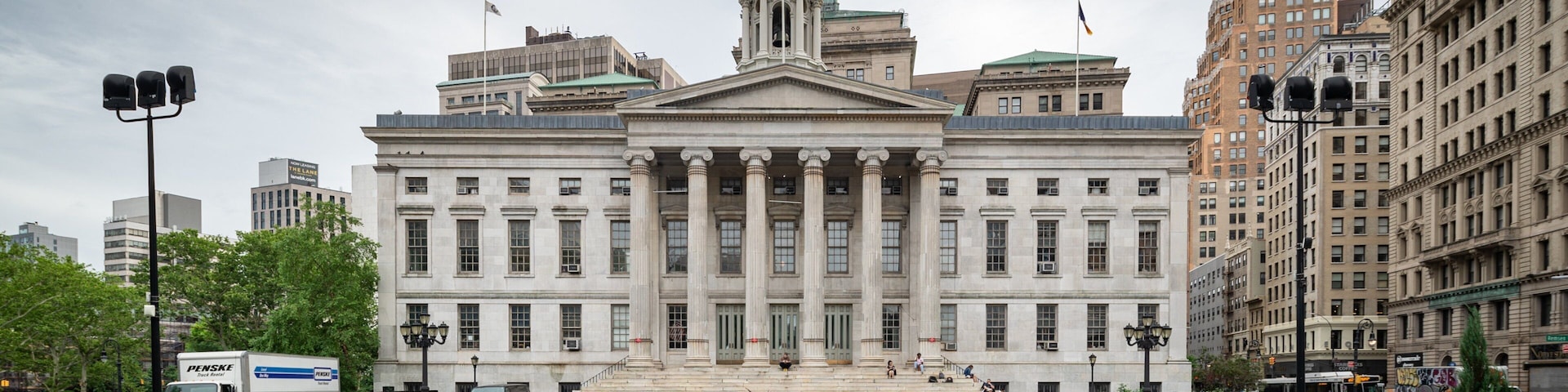 Brooklyn Borough Hall showing an administrative buidling, a park and heritage architecture