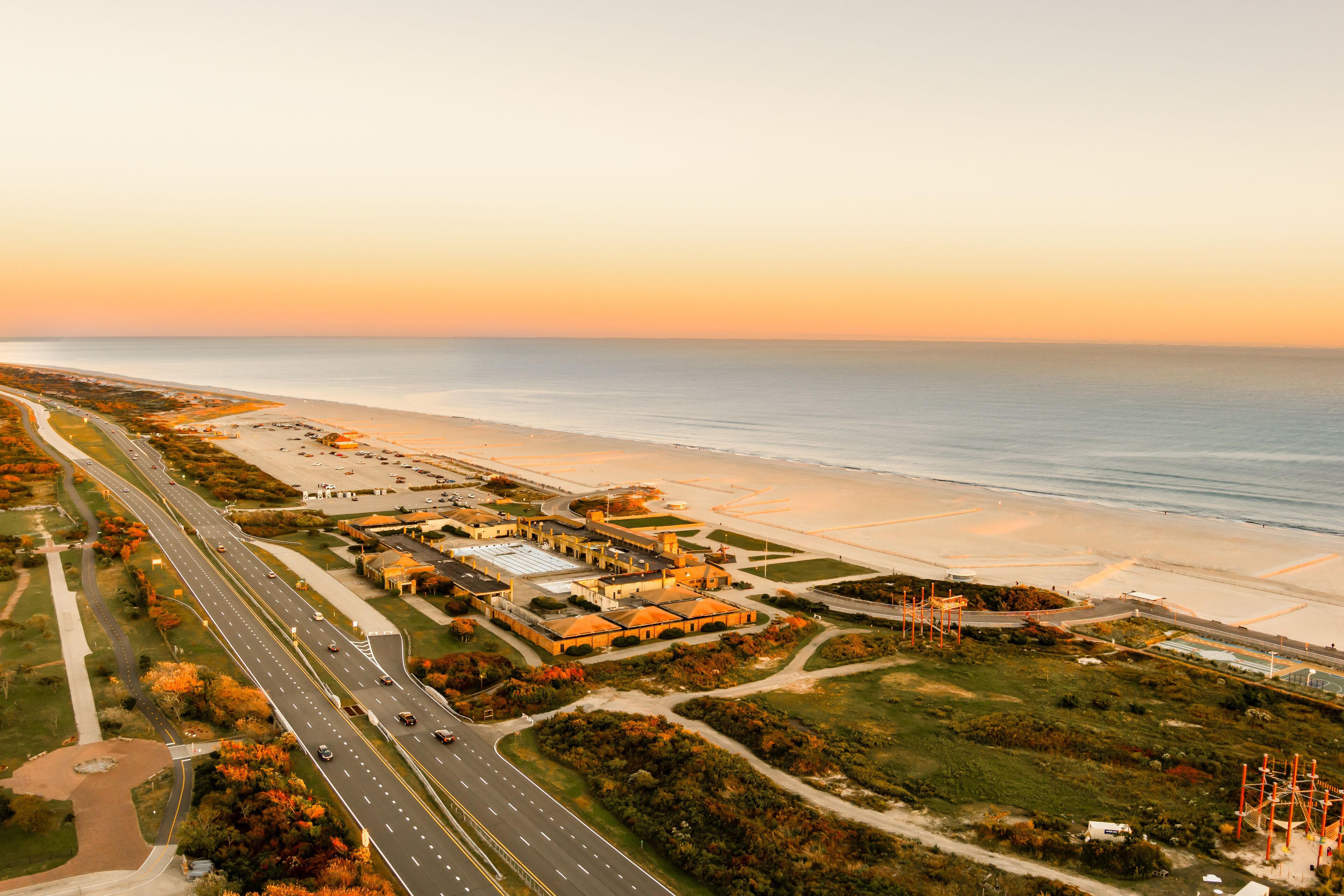 Aerial View of Jones Beach Long Island at sunset Ocean Parkway Atlantic Ocean orange