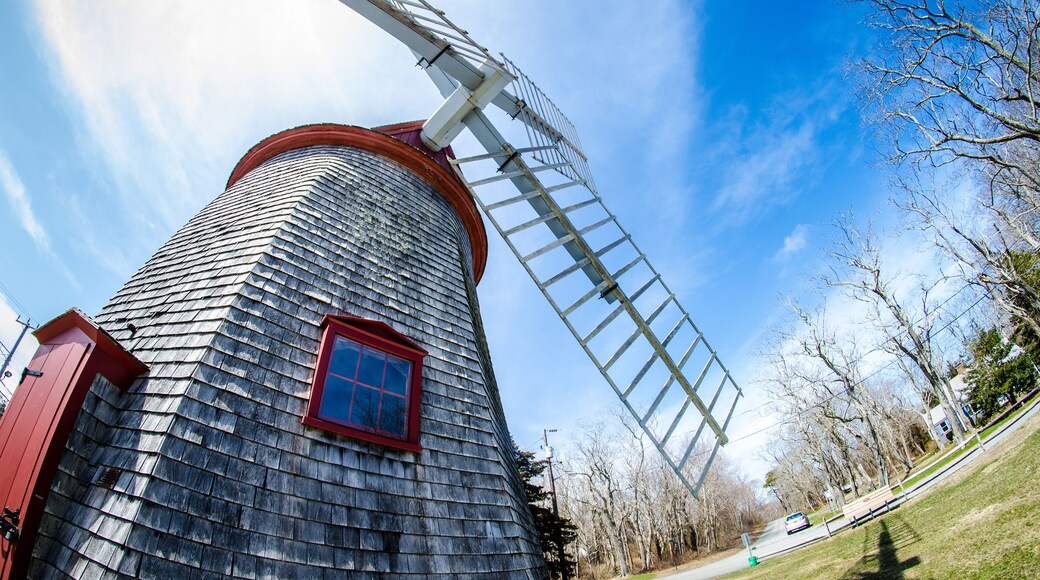 Eastham Windmill was built in 1680 and today, this historic old fashioned mill sits in a Cape Cod Park in Massachusetts. Fisheye lens view