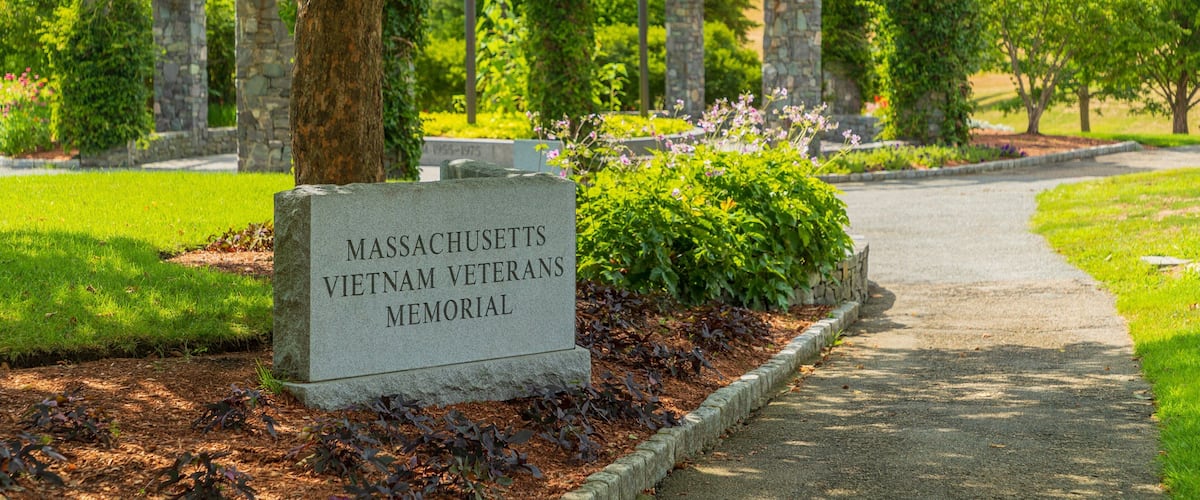 Massachusetts Vietnam Veterans Memorial featuring a park