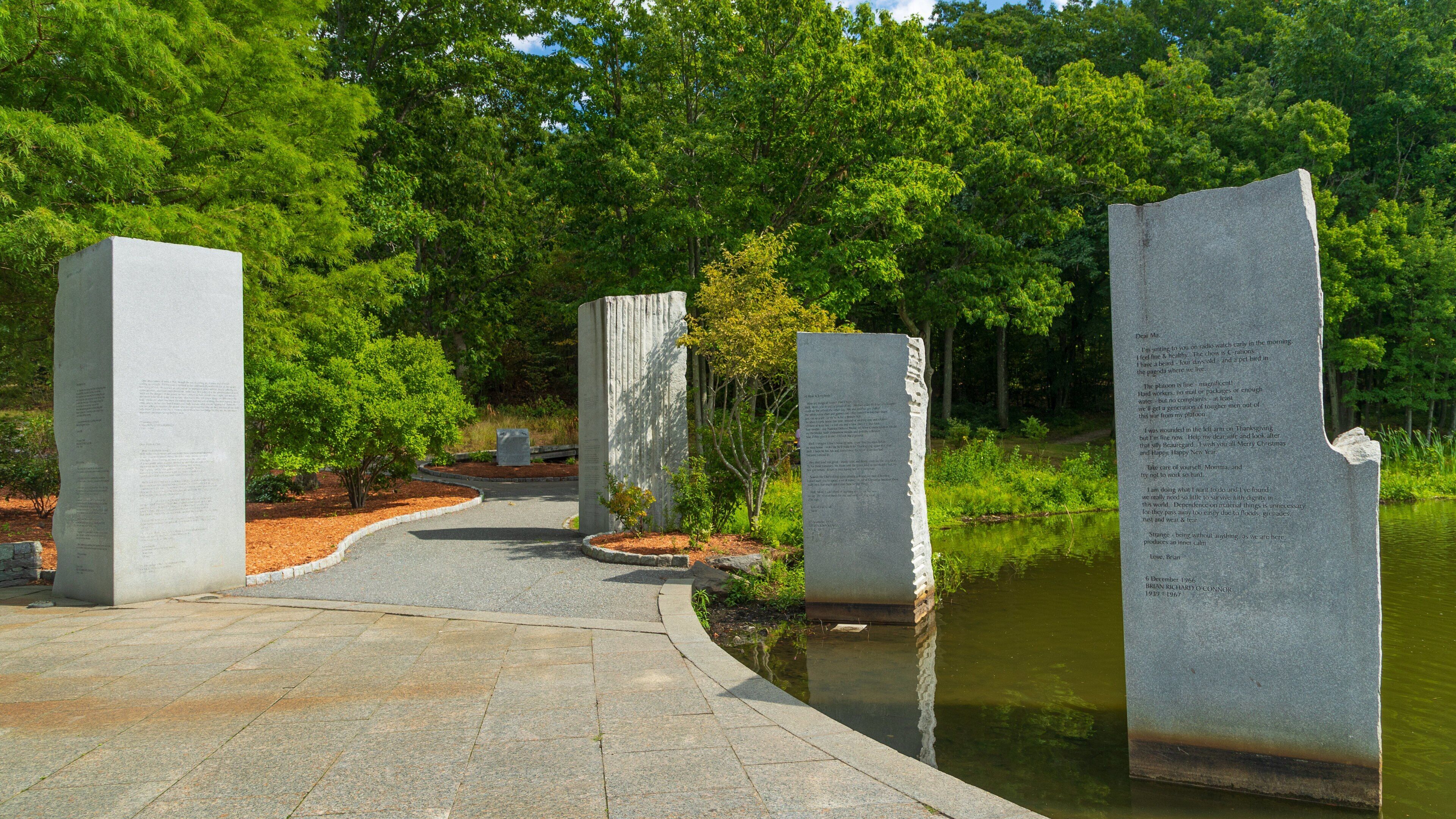 Massachusetts Vietnam Veterans Memorial which includes a pond