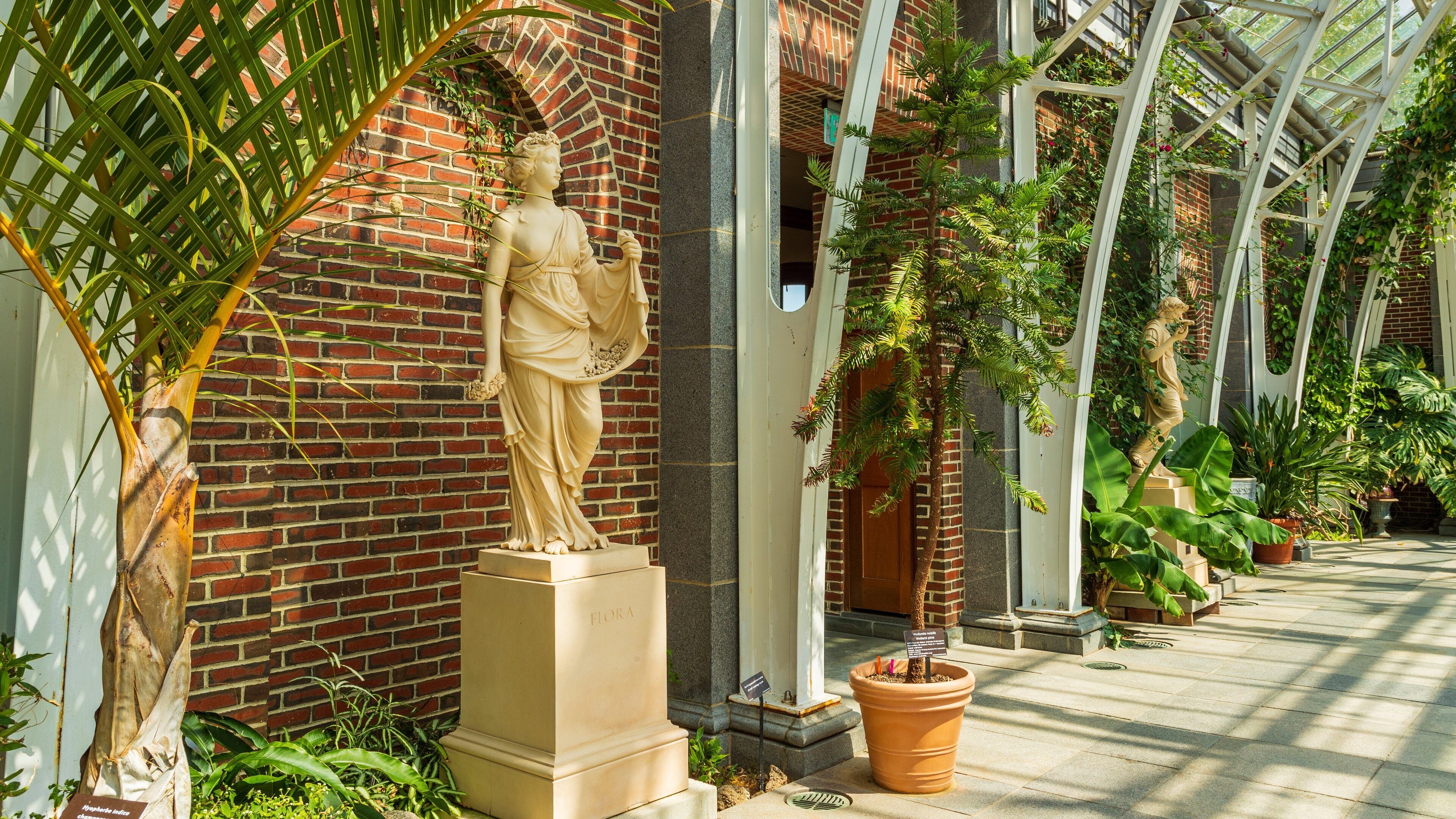 Tower Hill Botanic Garden showing a statue or sculpture, a park and interior views