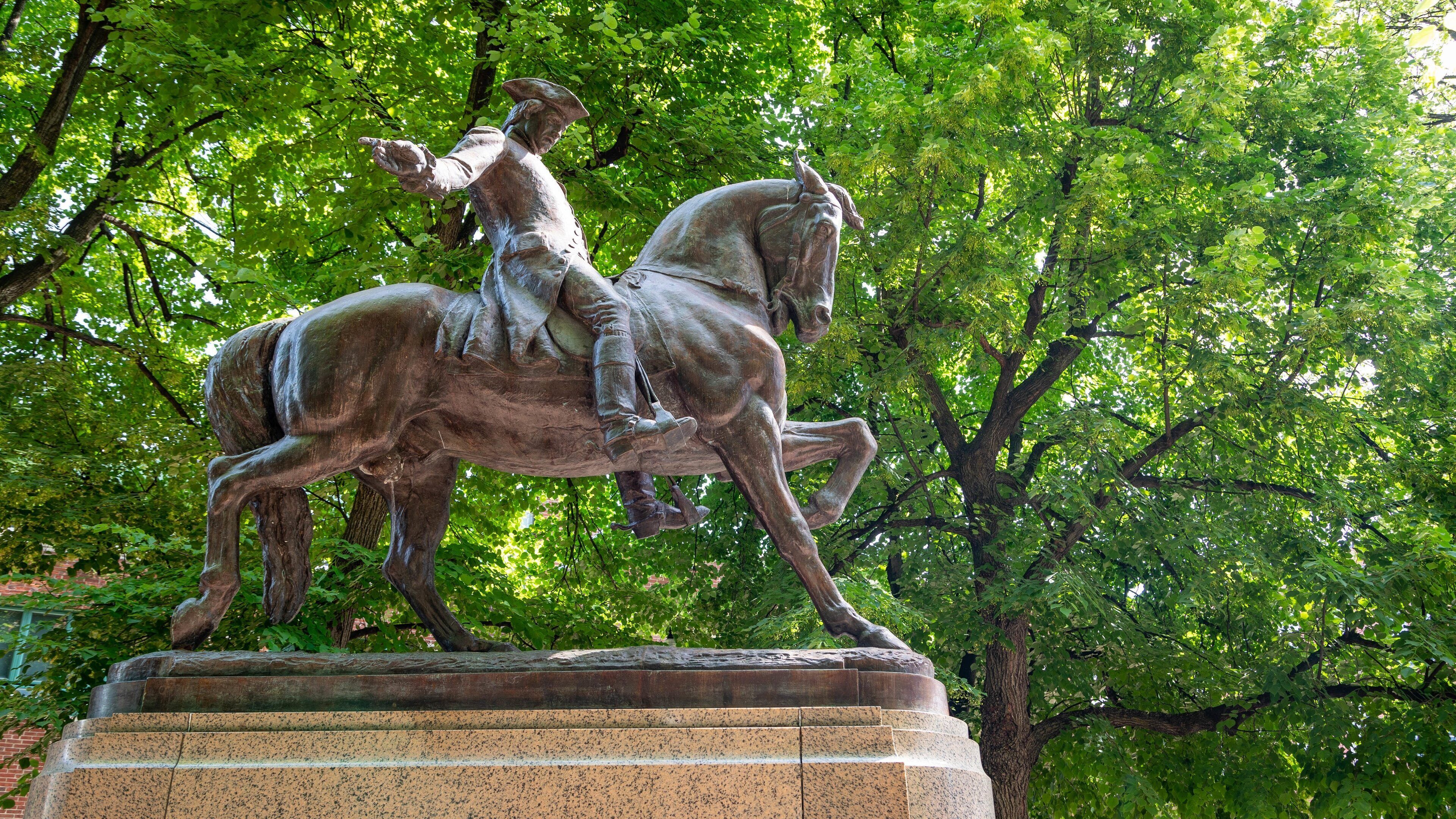Statue of Paul Revere which includes a statue or sculpture