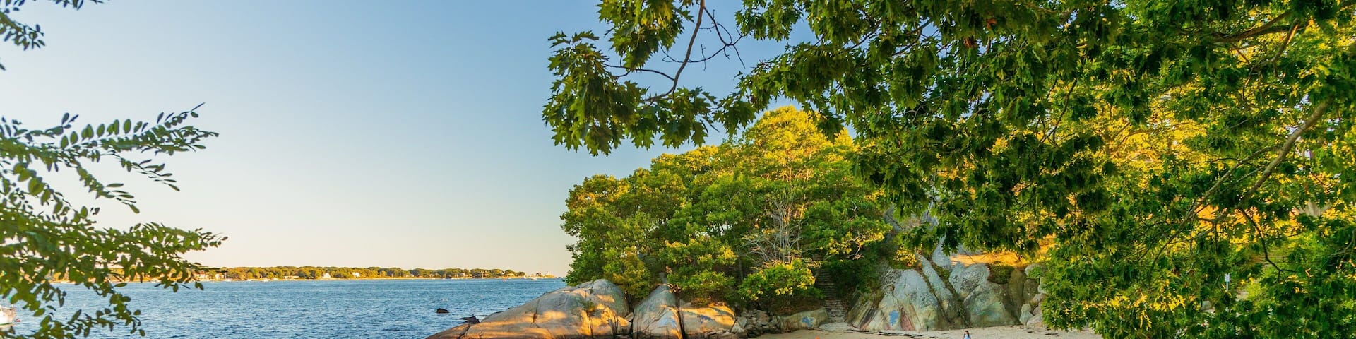 Half Moon Beach which includes a beach, general coastal views and a sunset