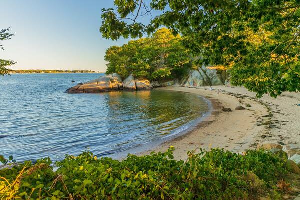 Half Moon Beach which includes a beach, general coastal views and a sunset