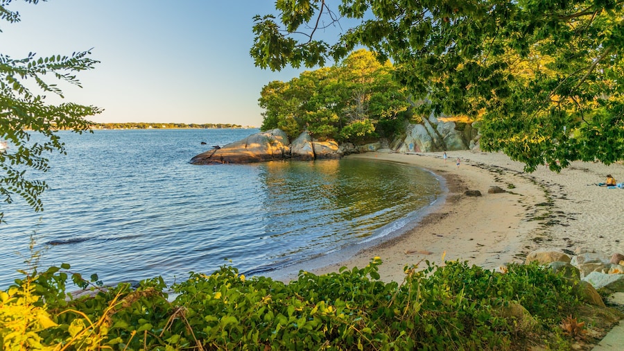 Half Moon Beach which includes a beach, general coastal views and a sunset