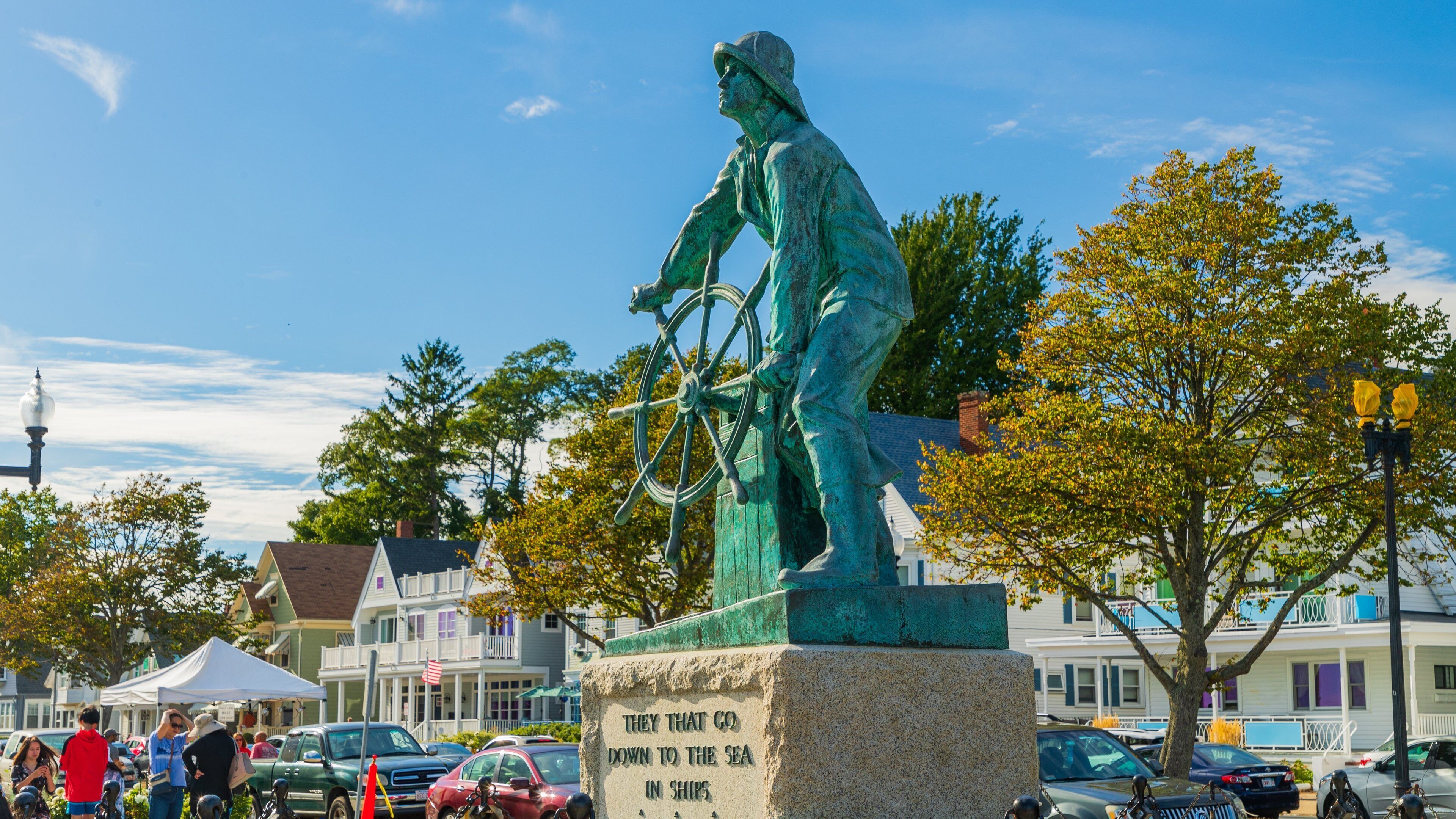 Fishermen\'s Memorial Monument which includes a statue or sculpture