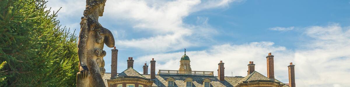 Castle Hill on the Crane Estate which includes heritage architecture, a statue or sculpture and a house