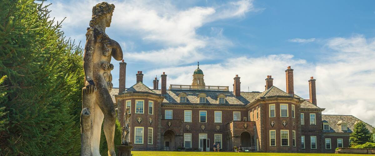 Castle Hill on the Crane Estate which includes heritage architecture, a statue or sculpture and a house