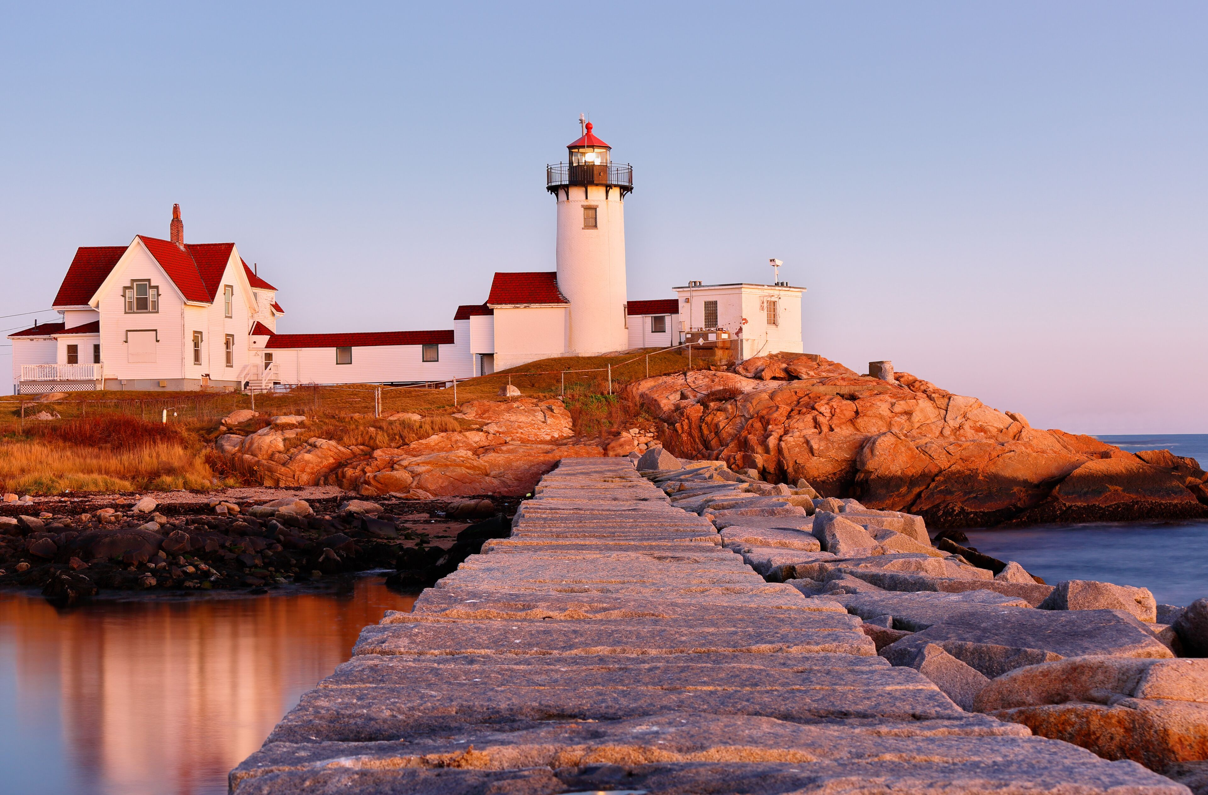 Beautiful sunset of Eastern Point Lighthouse at Gloucester, Massachusetts, USA. The Lighthouse is One of Five iconic lighthouses along the Cape Ann coastline.
