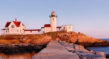 Beautiful sunset of Eastern Point Lighthouse at Gloucester, Massachusetts, USA. The Lighthouse is One of Five iconic lighthouses along the Cape Ann coastline.