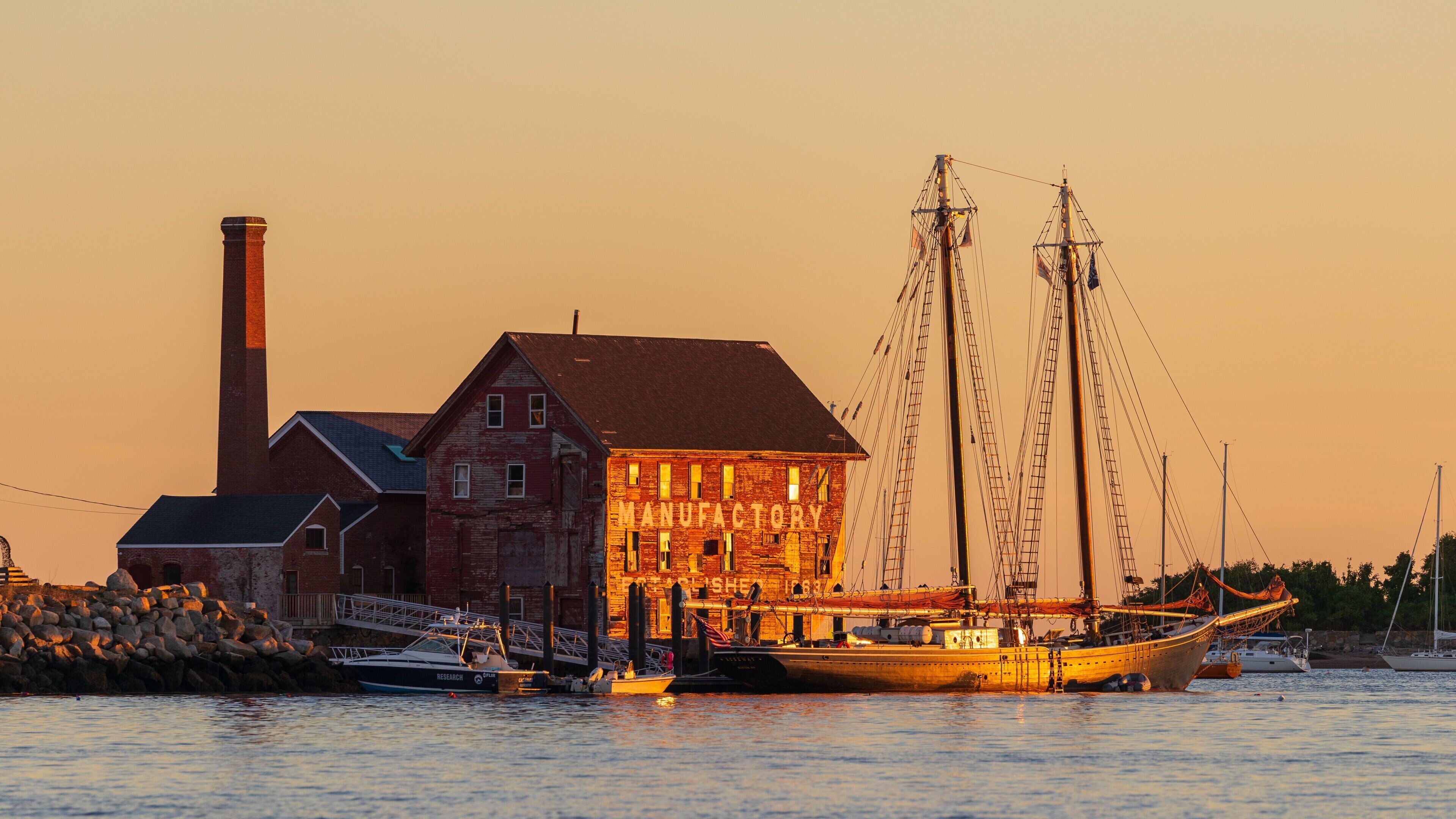 Maritime Gloucester showing a sunset and a bay or harbor