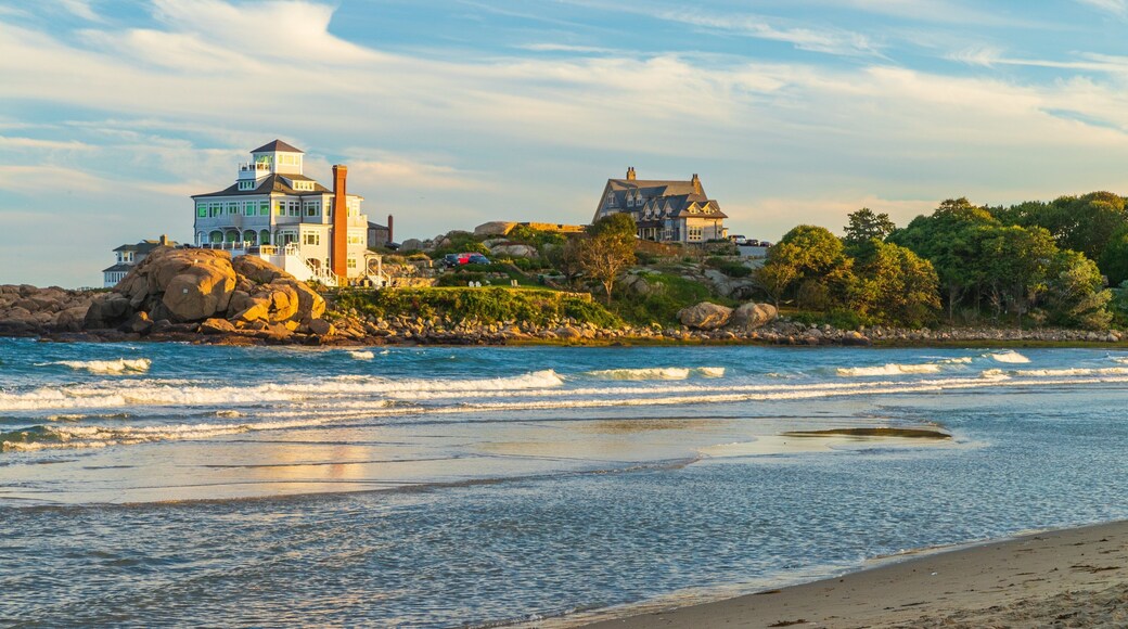 Good Harbor Beach featuring a sunset, general coastal views and rocky coastline