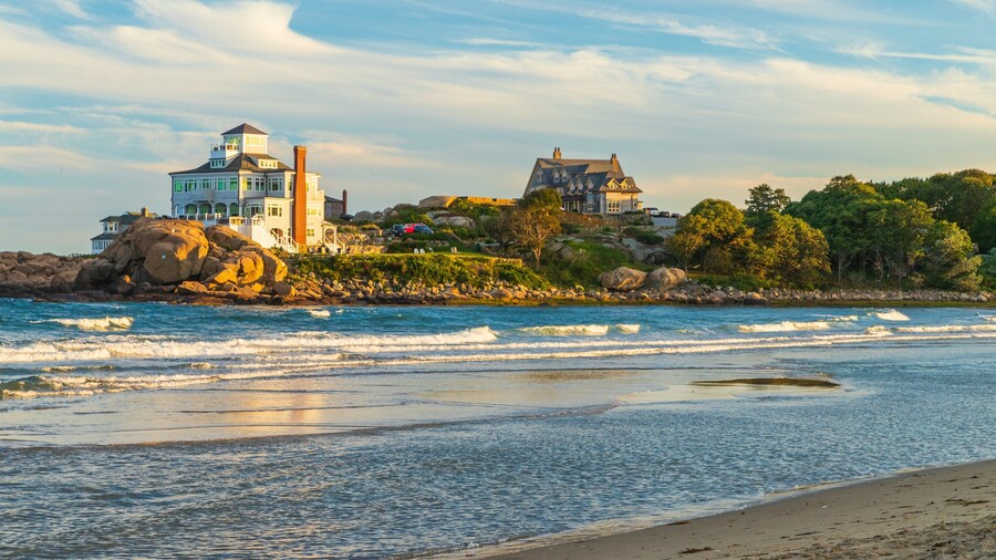 Good Harbor Beach featuring a sunset, general coastal views and rocky coastline