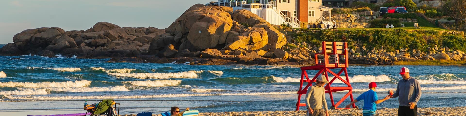 Good Harbor Beach featuring a sunset, a sandy beach and general coastal views
