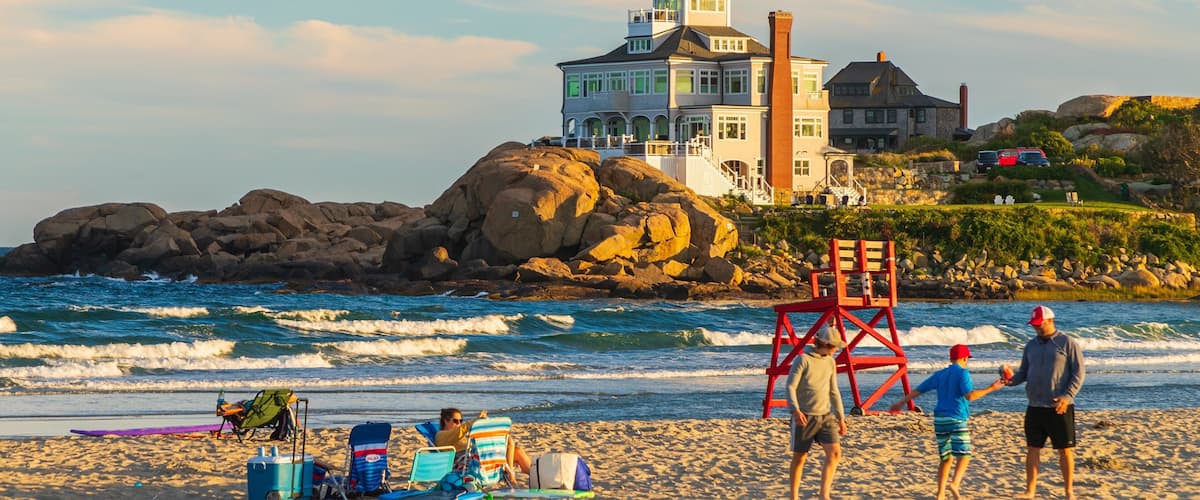 Good Harbor Beach featuring a sunset, a sandy beach and general coastal views