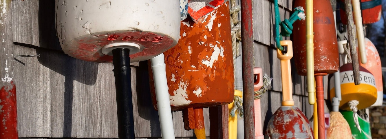 Buoys on a wall