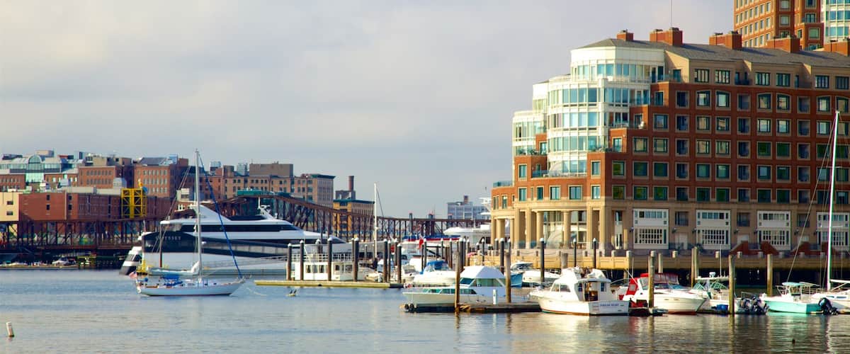HarborWalk showing a bay or harbor and a city