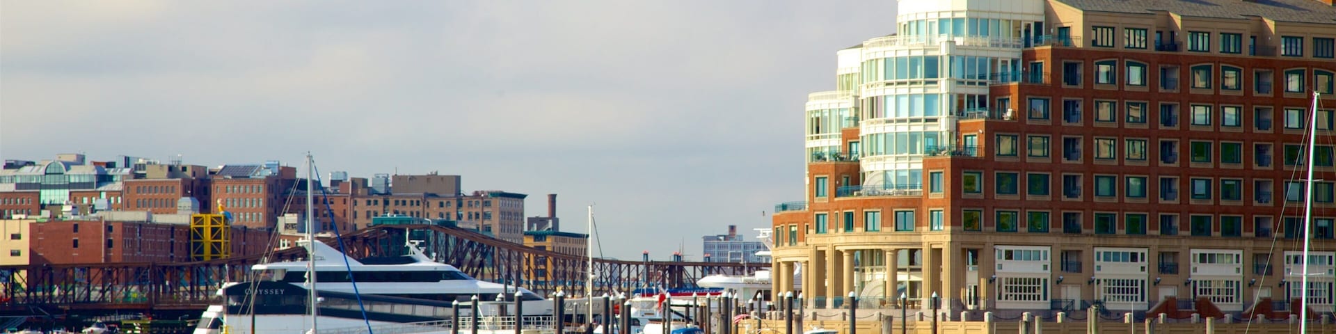 HarborWalk showing a bay or harbor and a city