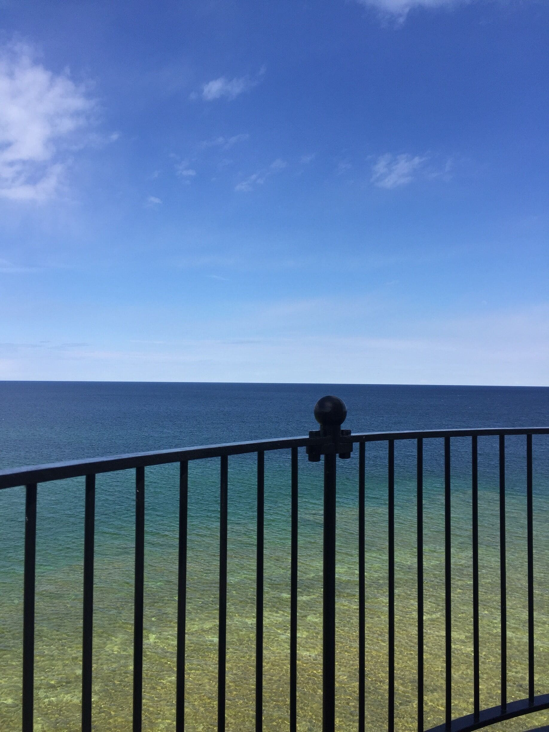 What A beautiful day to go see Lake Michigan from the top of the lighthouse. #Blue Travel Photo Contest