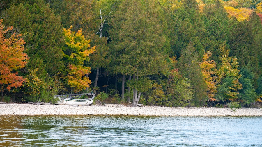 School House Beach on Washington Island Door County Wisconsin autumn colors boat in the distance sunset