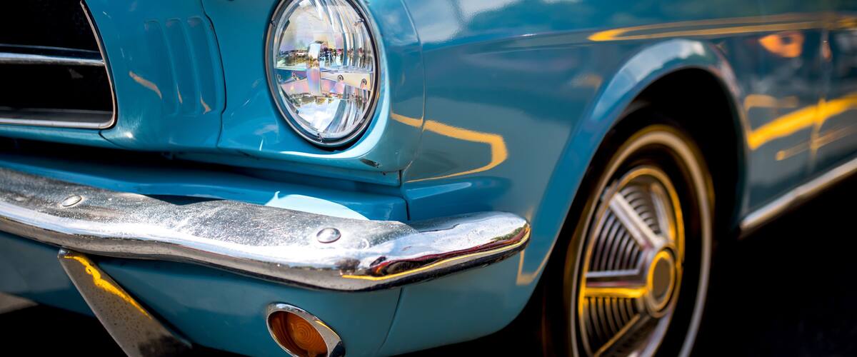 Close up view of blue classic American muscle car.