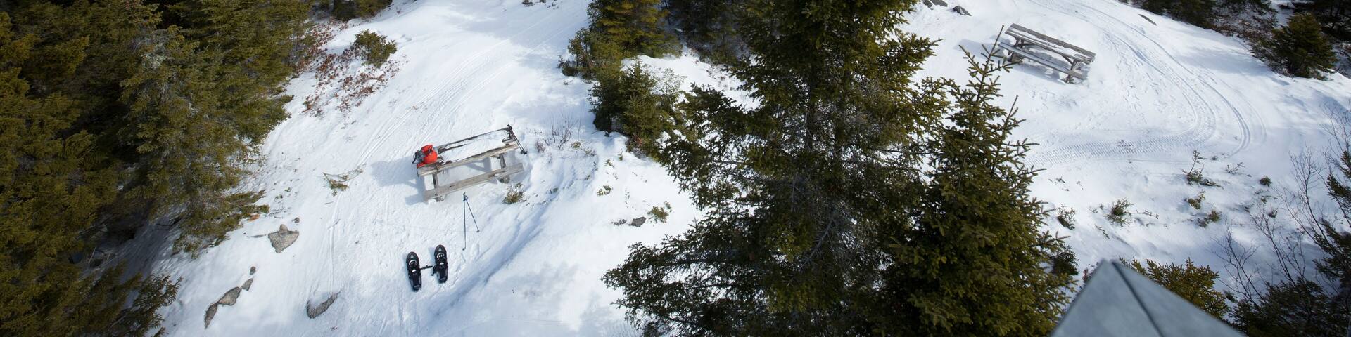 Winter view of an ice covered Cupsuptic Lake, Rangeley, Maine.