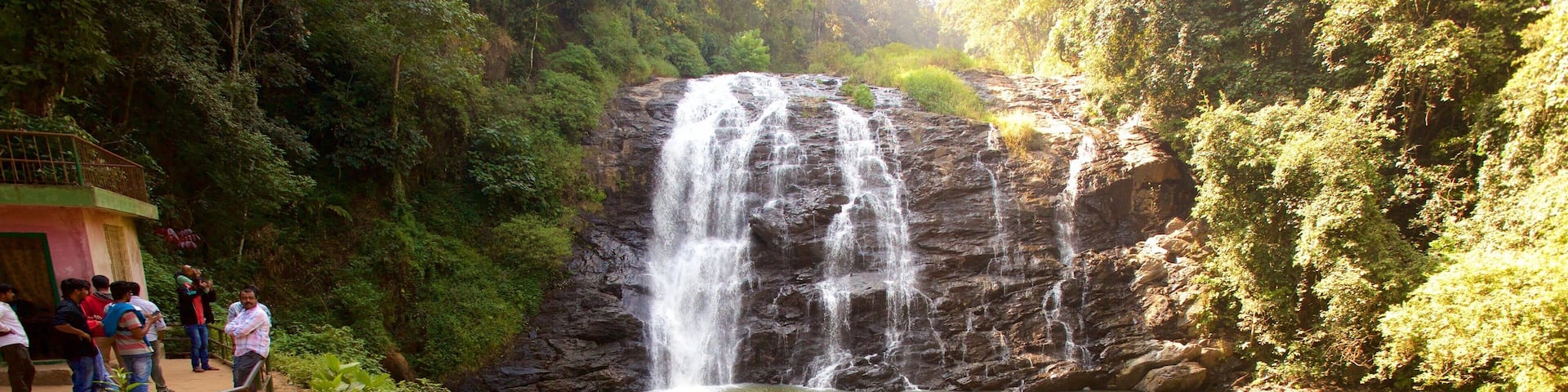 Madikeri featuring a lake or waterhole and a waterfall