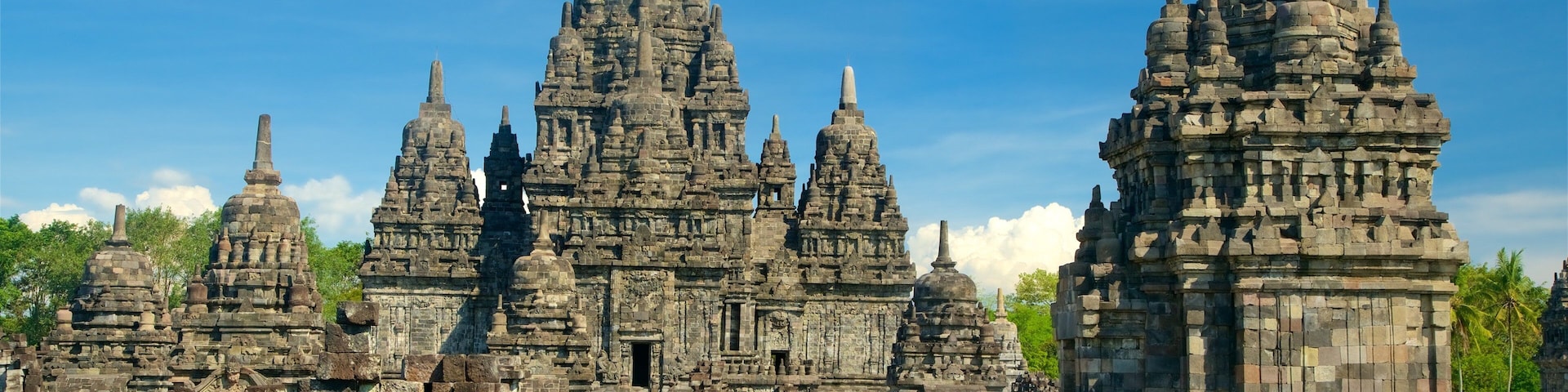 A temple complex with multiple stone structures and ruins.