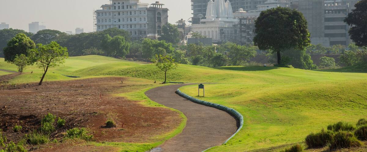 Kharghar Valley Golf Course featuring a city and golf