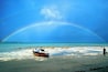 Double rainbow on paradise beach