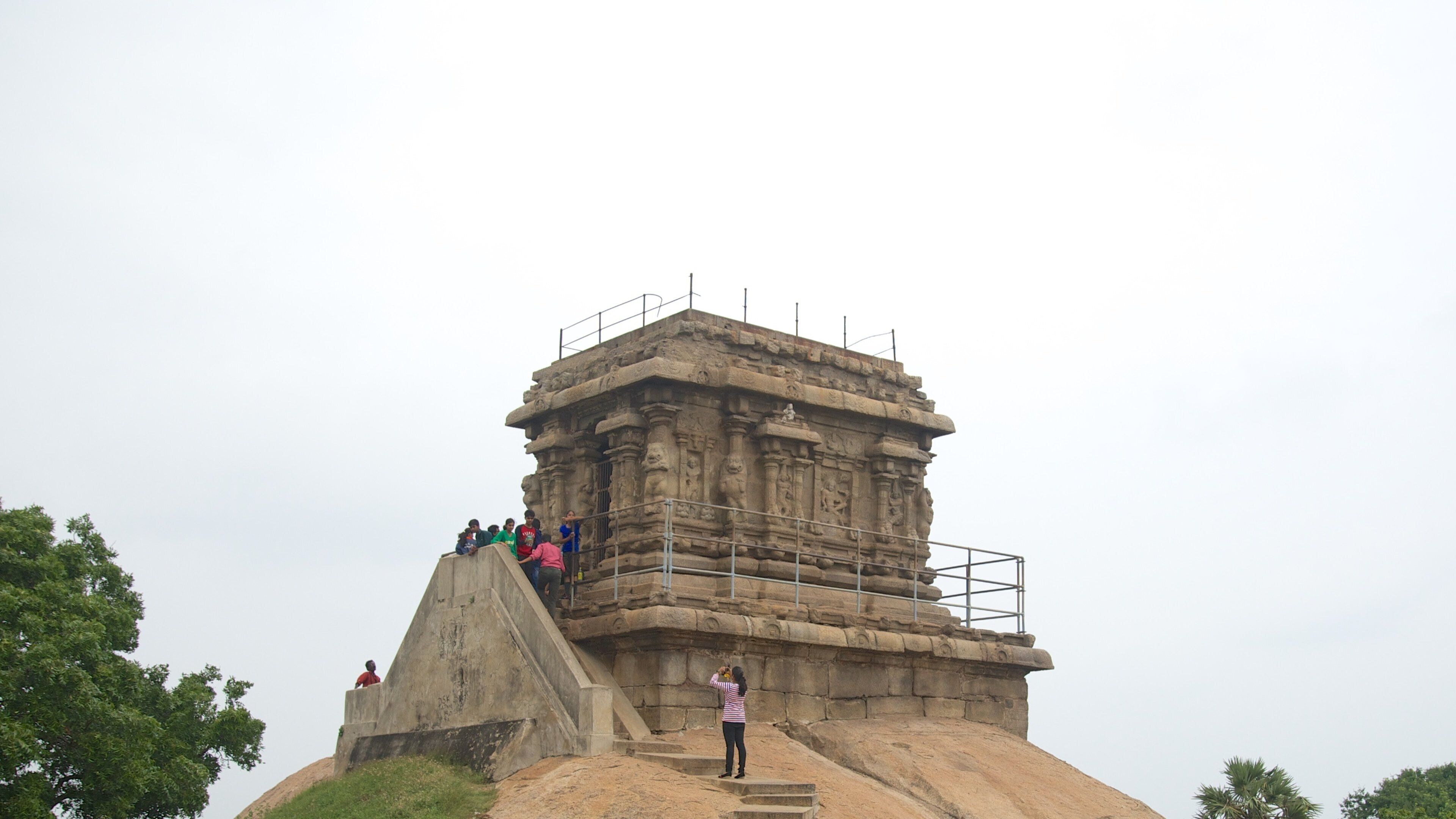 Mahishasuramardini Mandapa featuring heritage architecture as well as a small group of people