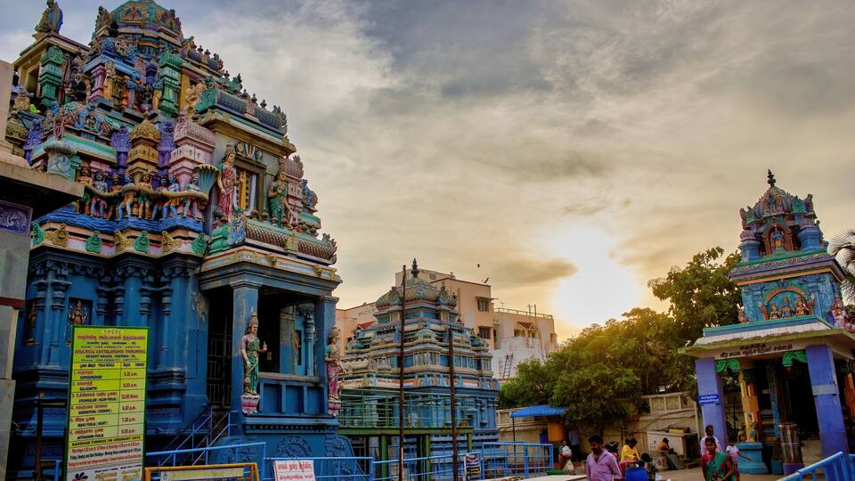 Chennai, South India - October 27, 2018: Interior of Ashtalakshmi Temple against dramatic sunset. Indian devotee worship or doing prayer inside a hindu temple