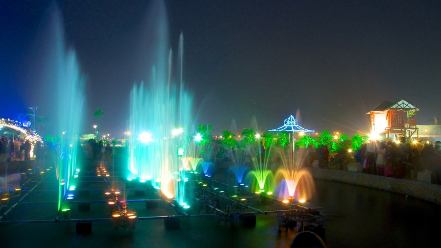 Kolkata featuring a fountain, night scenes and nightlife