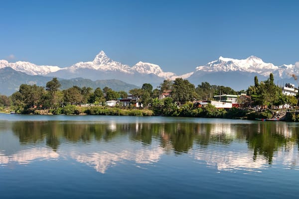View at Annapurna mountain range and its reflection in Phewa lake in Pokhara, Nepal
