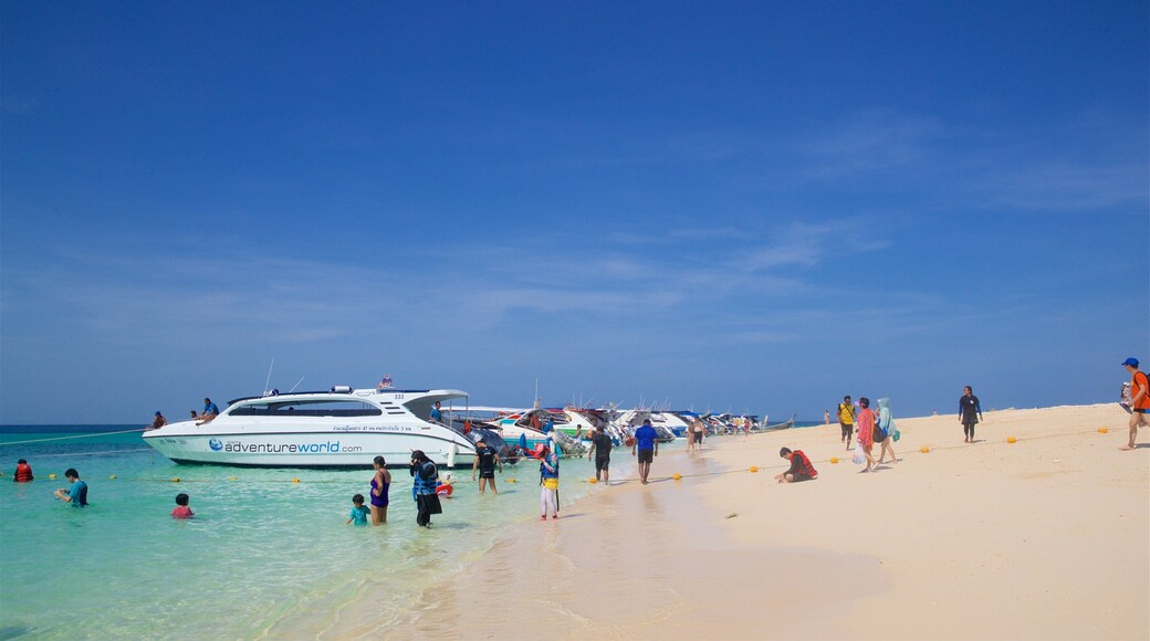 Bamboo Island which includes a sandy beach, boating and swimming